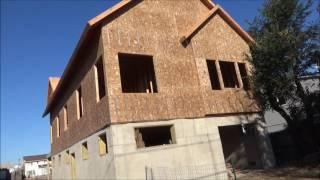 khoury house wrapped in particle and plywood