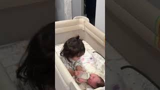 Baby Taking Care of an Even Tinier Baby—So Heartwarming! 