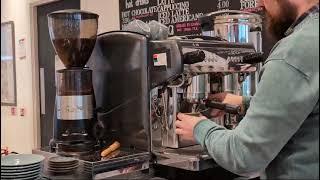Luke Making a coffee in the Towpath Cafe