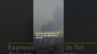 Explosions in Tel Aviv as air raid sirens blare out
