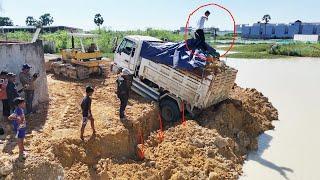 Amazingly!! 5-Ton Truck Sinks While Unloading Dirt: Komatsu D31P Dozer saves the day