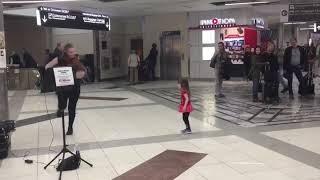 An adorable moment at the Atlanta Airport!