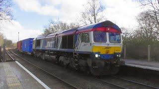 Class66 container freight trains and Rail Tamper DR 73944 at westerfield station 13/3/25