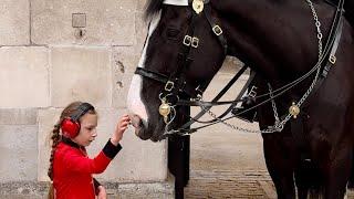 A Touch of Kindness: When the King's Guard Met a Special Little Girl"