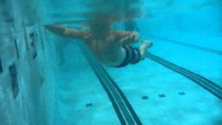 3yo William relaxing next to the wall in the pool