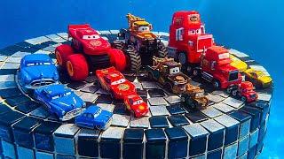 Disney Pixar Cars falling into deep pool, Lightning McQueen, Tow Mater, Mack, Sally, Francesco