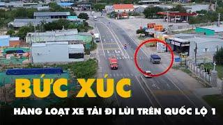 Hàng loạt xe tải đi lùi 70m trên quốc lộ 1, dân bức xúc