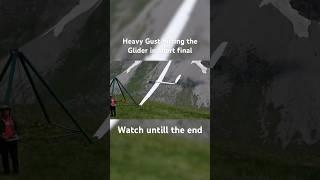 A Heavy gust hit this Glider in short final, but awesome pilot reaction saved the day
