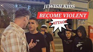 JEWISH KIDS BECOME VIOLENT AND ATTACK THE STREET PREACHERS BECAUSE OF THE NAME OF JESUS. #ISRAEL