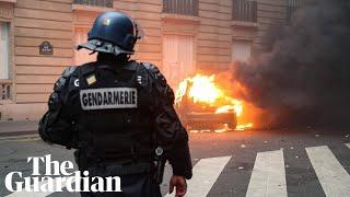 Riot police use teargas and water cannon in clashes with gilets jaunes in Paris