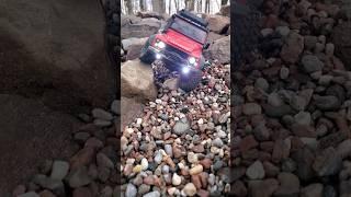 Red Defender driving down Little Piddle Creek on the Back Shed RC Course. #trx4m  #LittlePiddleCreek