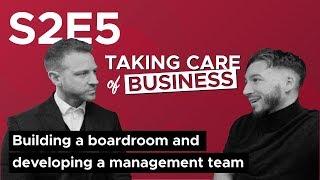 Building and boardroom and developing a management team.