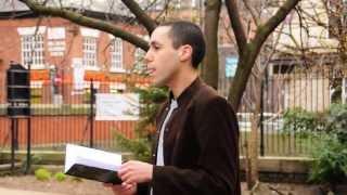 Adam Lowe reads during Young Enigma's Pride & Prejudice for LGBT History Month