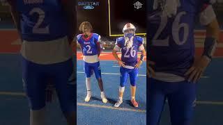 Ravenna Ravens CJ Ross, Jaxon Kelly & coach Brian “Fuzz” Coman after their 24-0 win over Springfield