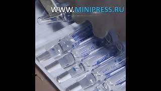 Машина для упаковки ПВХ блистеров в картонную коробку