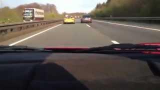 Ferrari 430 Scuderia chasing a Porsche 996 GT3 Cup by Edo Competition on german Autobahn