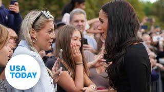 Meghan Markle embraces Queen Elizabeth II mourner | USA TODAY