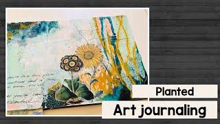 Art journaling with acrylic paint, oil pastels and stickers book