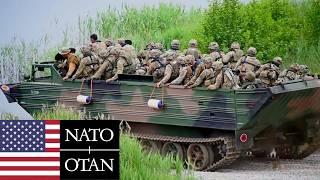 US Army, NATO. Soldiers and armored vehicles during military exercises in Poland.