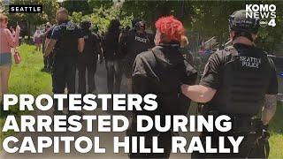 Rally and counter-protest unfold at Cal Anderson Park, police arrest multiple protesters