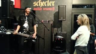 Dug Pinnick at the Schecter booth with Rex Brown checking out his amp