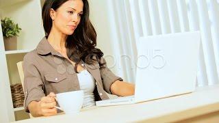 Caucasian Female At Home With Laptop and Coffee. Stock Footage