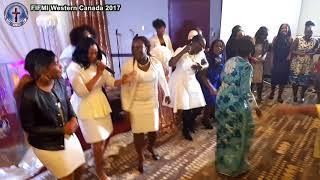 Apostle Eunor Guti dancing with the youth in Edmonton CANADA