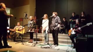 Olivia singing at the school music class recital