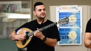 Guitarist pulls sweet strings for cancer patients