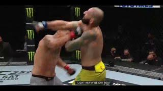 Ike Villanueva KO's Vinicius Moreira. Kick Punch vs Right Hook.