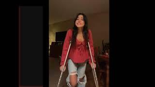 Lovely professional woman with a broken ankle, crutches