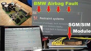 BMW SGM/SIM module fault 93F9 airbag light on. Module replacement and programming.