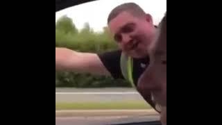 Fella Grabs On To Car And Pretends To Be Superman