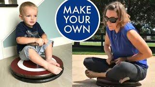 I LOVE this DIY Sit N Spin Toy Made with Wood Circles and Pipes - Handmade Sit and Spin Toy