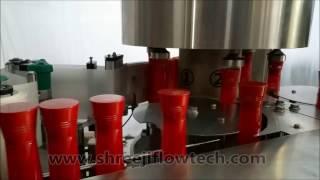 ROTARY STICKER LABELING MACHINE - Shreeji Flowtech Systems