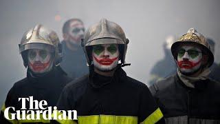 Firefighters clash with riot police in France protests