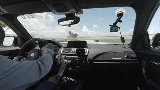 BMW M2 M Performance Edition w/ Dinan P2 tune in traffic on track at Homestead-Miami Speedway