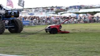 MONSTER TRUCKS RIP A CAR IN HALF - Big Pete & Grim Reaper.