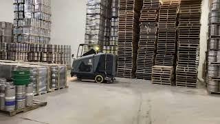 The Karcher B 300 R I Sweeper-Scrubber cleaning a beverage distribution facility!