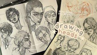 how I draw faces/heads from different angles 