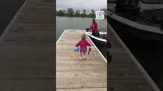 Excited Little Girl Runs Towards Dad's Boat to go Fishing