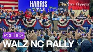 Heavy rain doesn't deter crowd as Tim Walz speaks in Asheville