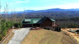 Custom log cabin in The Summit at 3065 Smoky Bluff Trl