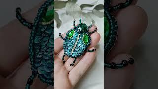 the beetle brooch is handmade. The Green Beetle