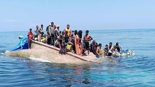 Desperate, dehydrated Rohingyas picked up in dramatic sea rescue | AFP