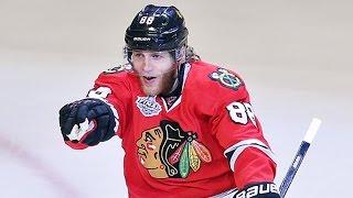 Richards sets up Kane to extend Hawks lead