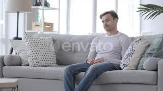 Tired Adult Man Sitting on Couch and Sleeping / Videohive, Stock footage, People