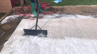 Scraping dirty water off rug. Deeply satisfying