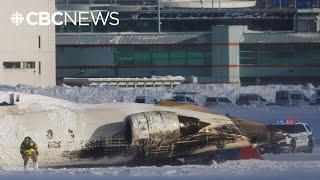 Watch passengers escape from flipped plane on a Toronto runway