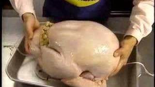 Uncomfortable woman teaches how to cook a turkey